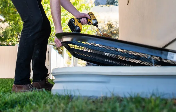 Installing a custom window well liner
